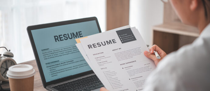 Candidate reviewing and improving a CV for an entry-level sales role