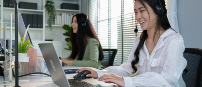 Sales Development Representative making a prospecting call in a modern sales office