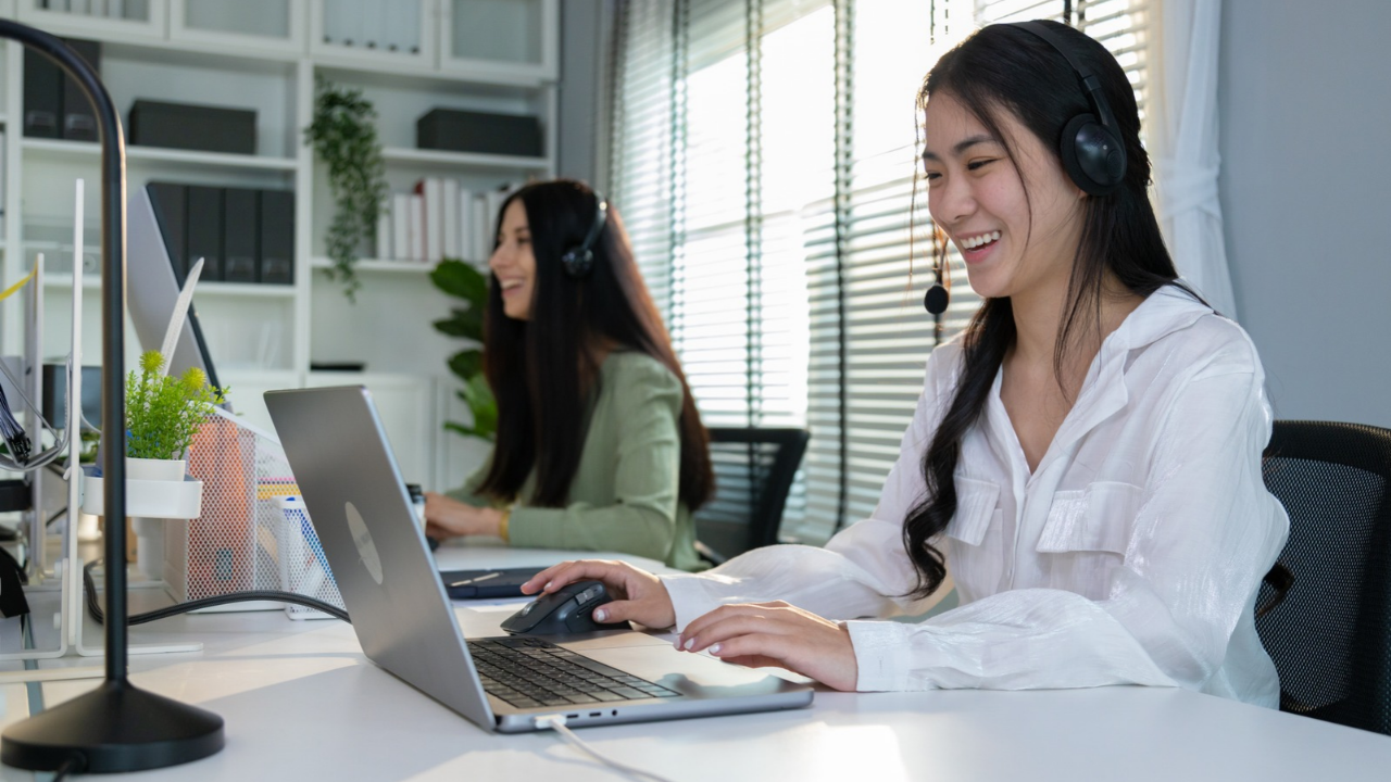 Sales Development Representative making a prospecting call in a modern sales office